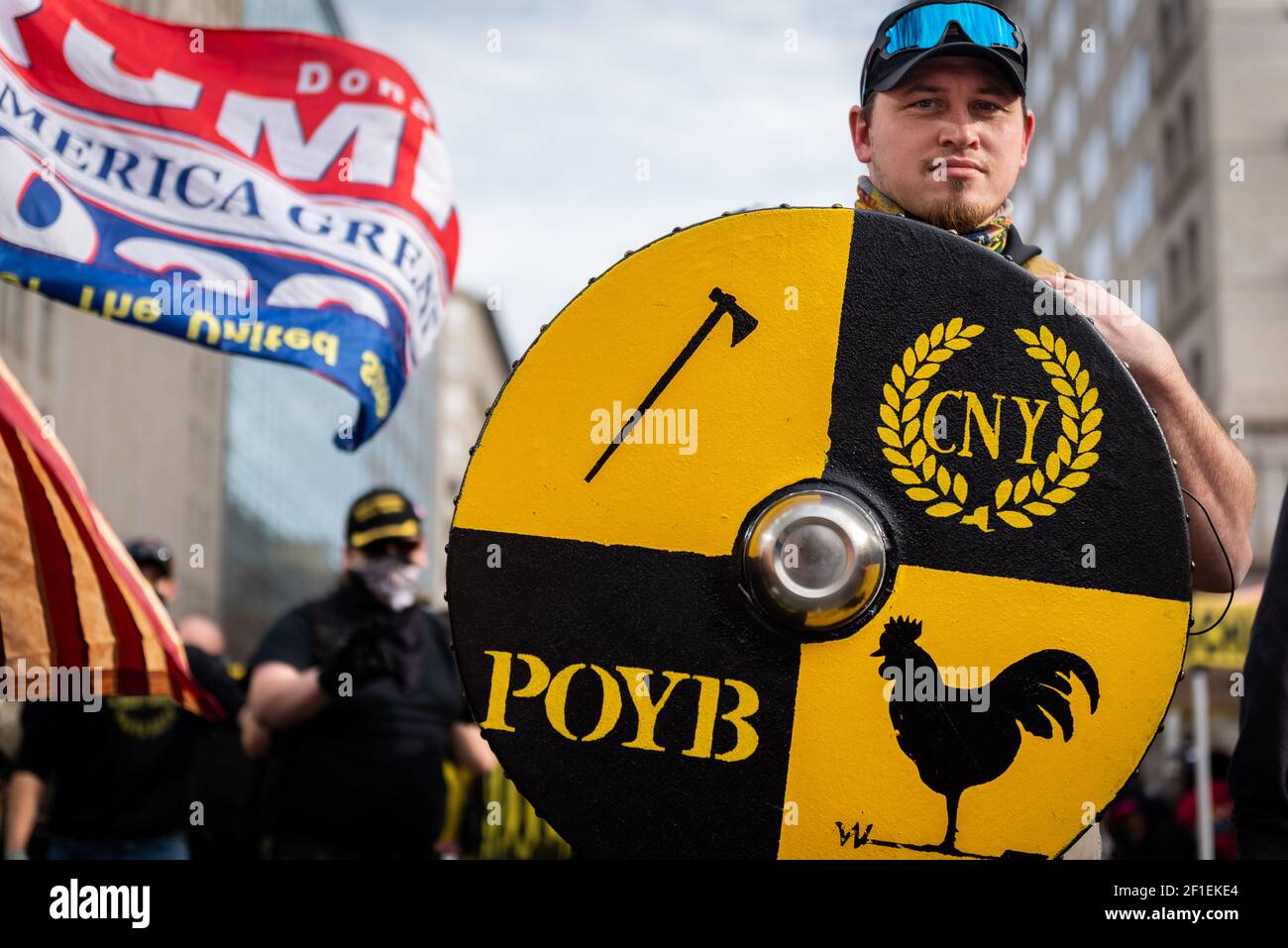 The far-right extremist group the Proud Boys take part in the 'Stop the Steal' rally on December 12, 2020 in Washington, DC. Stock Photo