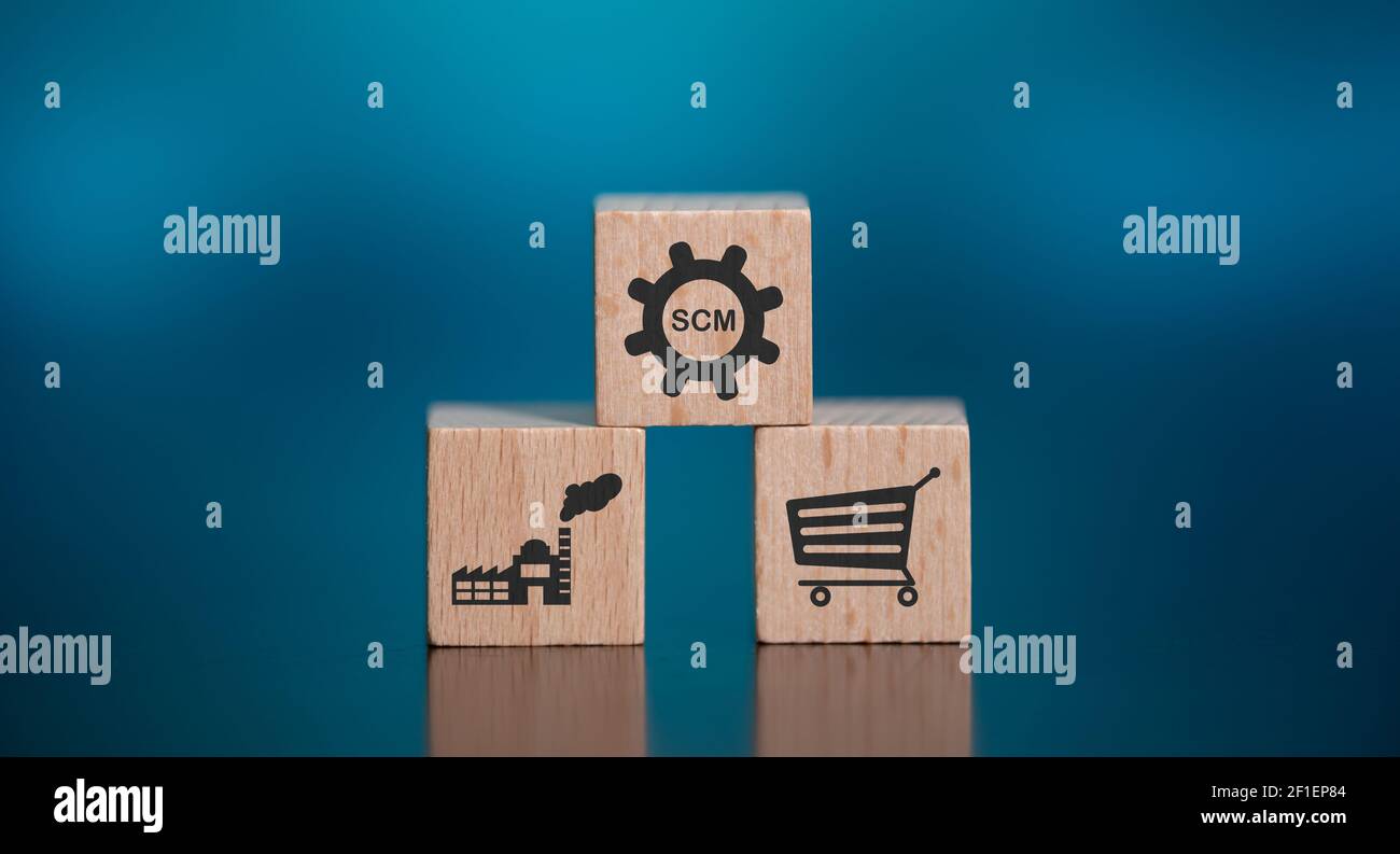 Concept of SCM with icons on wooden cubes Stock Photo - Alamy