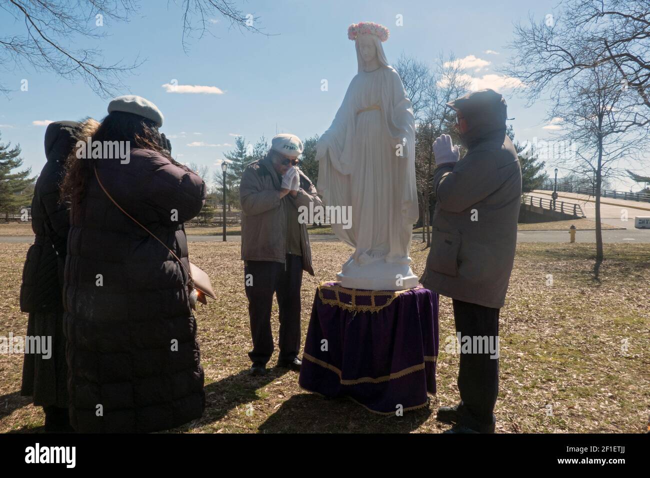 At the conclusion of an outdoor service, worshippers from Saint Michael