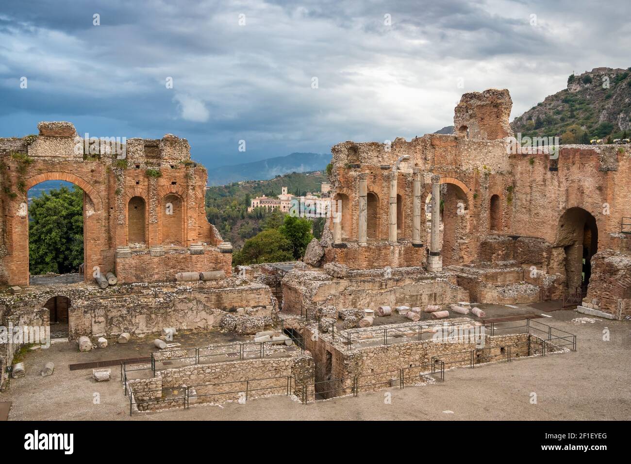 Amphitheatre of Taormina in Siciliy at cloudy day, Italy. Stock Photo