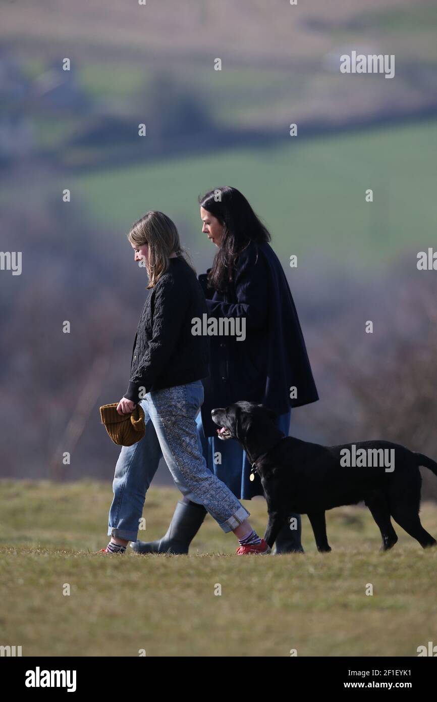 Stroud, UK, 8th March, 2021. UK Weather. Beautiful day for a walk with a friend over Rodborough Common in Gloucestershire as lockdown rules are easing. Credit: Gary Learmonth/Alamy Live News Stock Photo