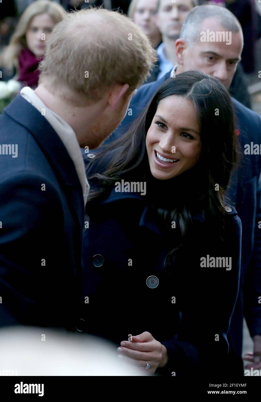 Britain's Prince Harry (L) and US actress Meghan Markle during a visit to the Terrence Higgins Trust World AIDS Day charity fair at the Nottingham Con Stock Photo