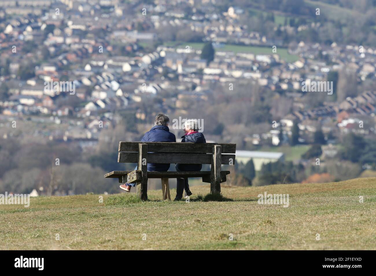 Stroud, UK, 8th March, 2021. UK Weather. Sunny day to meet with a friend on Rodborough Common in Gloucestershire as lockdown rules are easing. Credit: Gary Learmonth/Alamy Live News Stock Photo