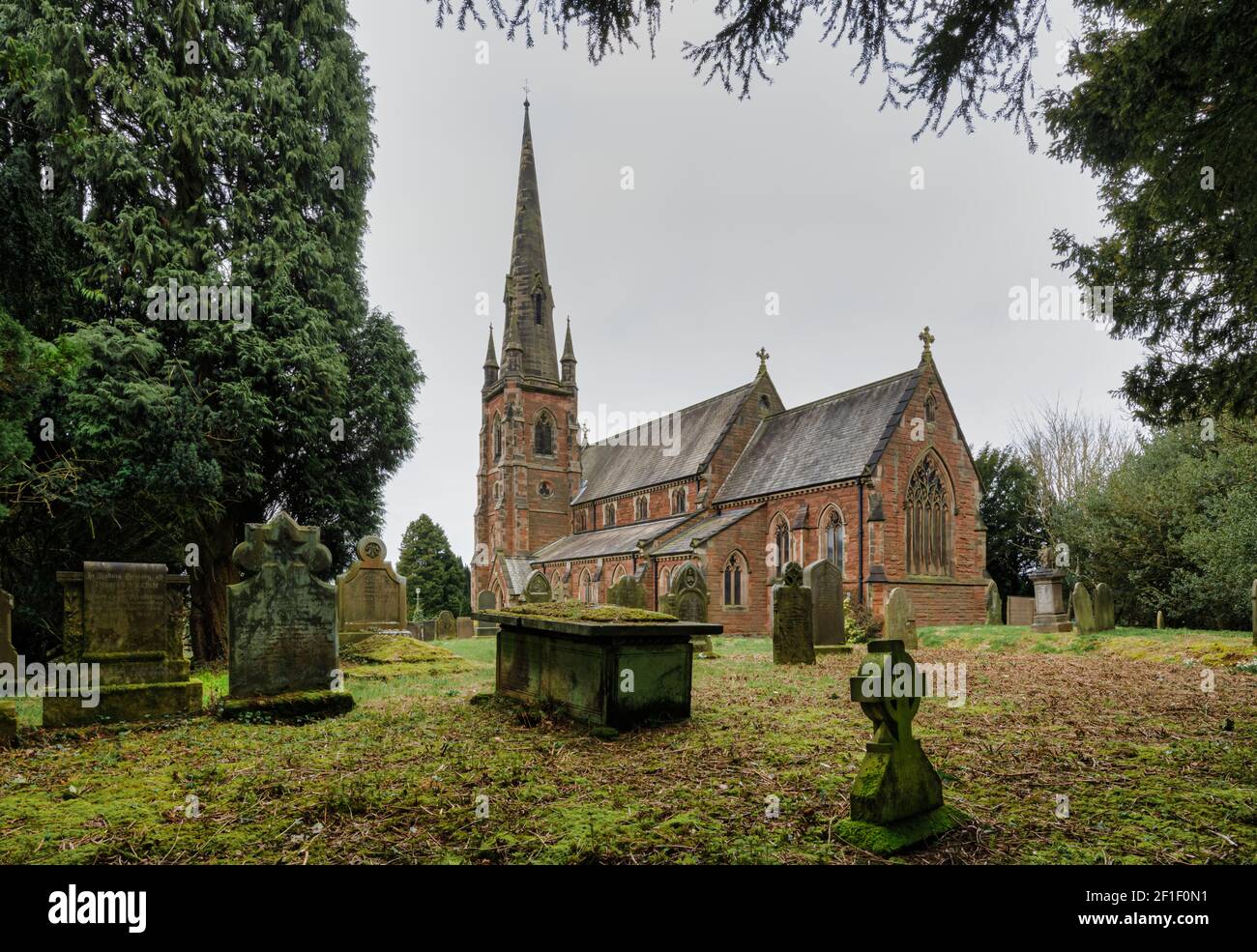 English rural church Staffordshire. St John the Baptist Keele is a Grade 11 listed building. It opened on 1st May 1870. Stock Photo