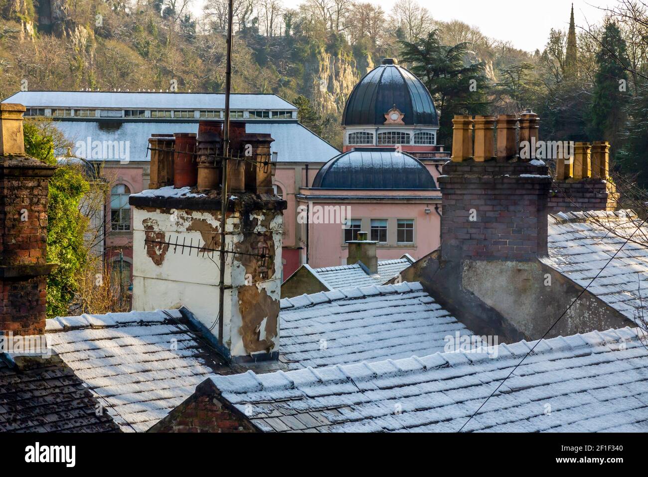 View across rooftops towards the dome and exterior of the Grand Pavilion in Matlock Bath Derbyshire Dales Peak District England UK Stock Photo