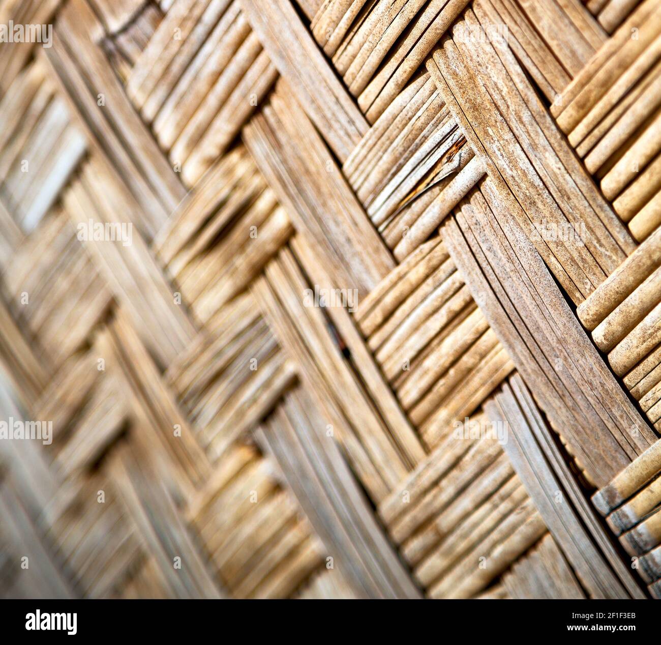 A wall build on wicker bamboo Stock Photo