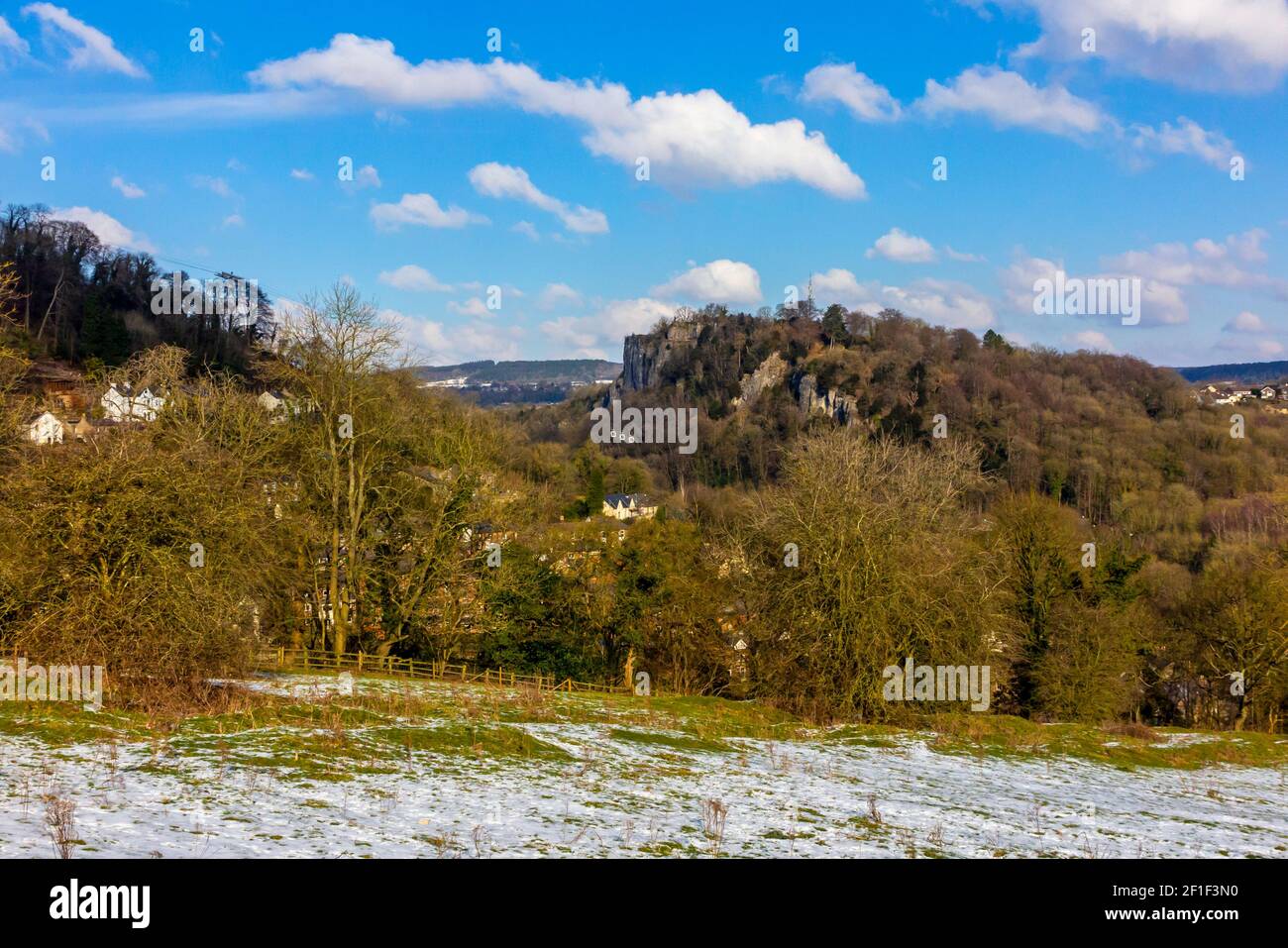 Snow covered landscape with trees overlooking High Tor near Matlock Bath in the Derbyshire Peak District England UK Stock Photo