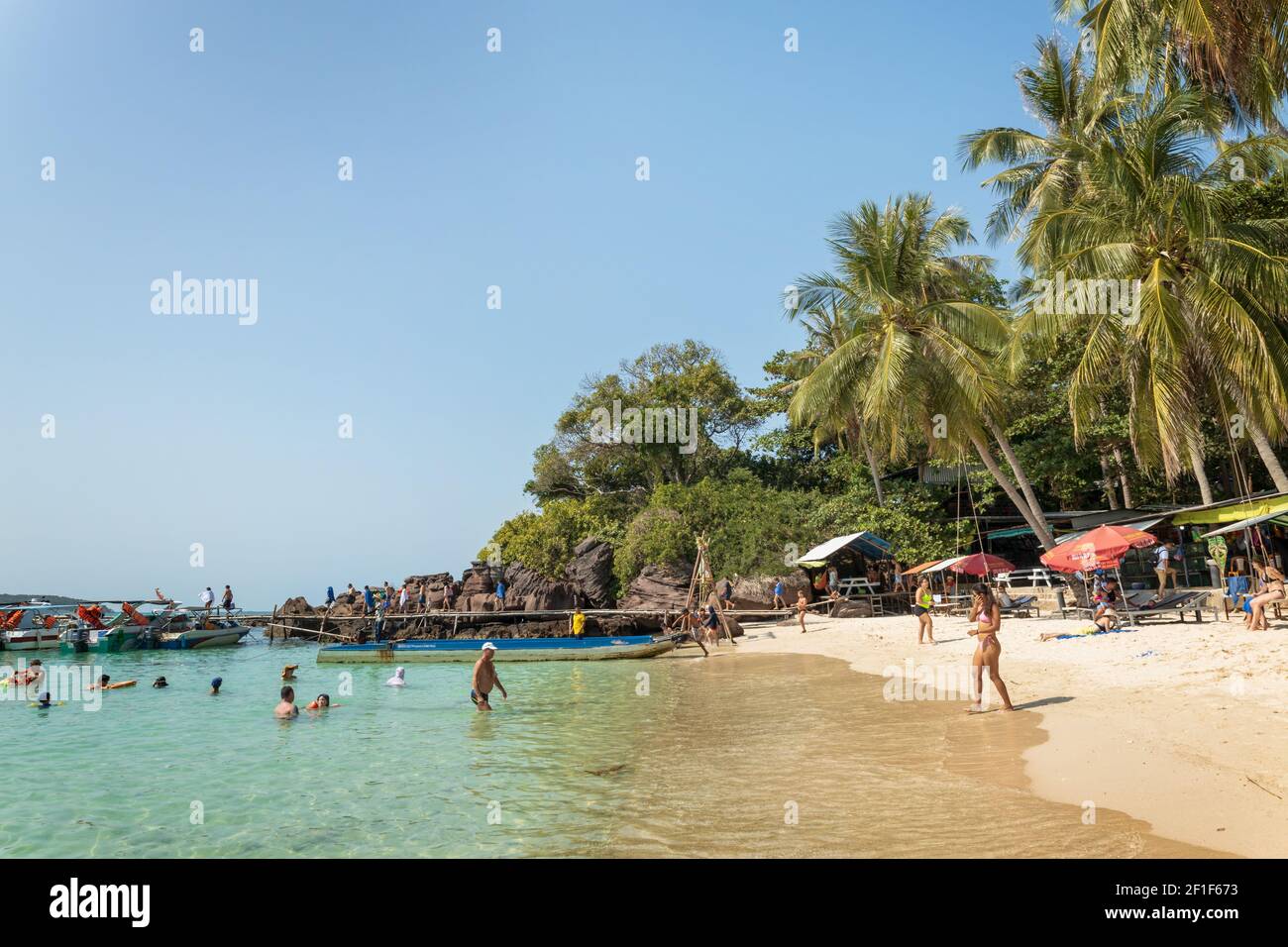 Tourists arrived by boats enjoying their day on the Fingernail island (vietnamese: Hon Mong Tay), An Thoi archipelago, Vietnam Stock Photo