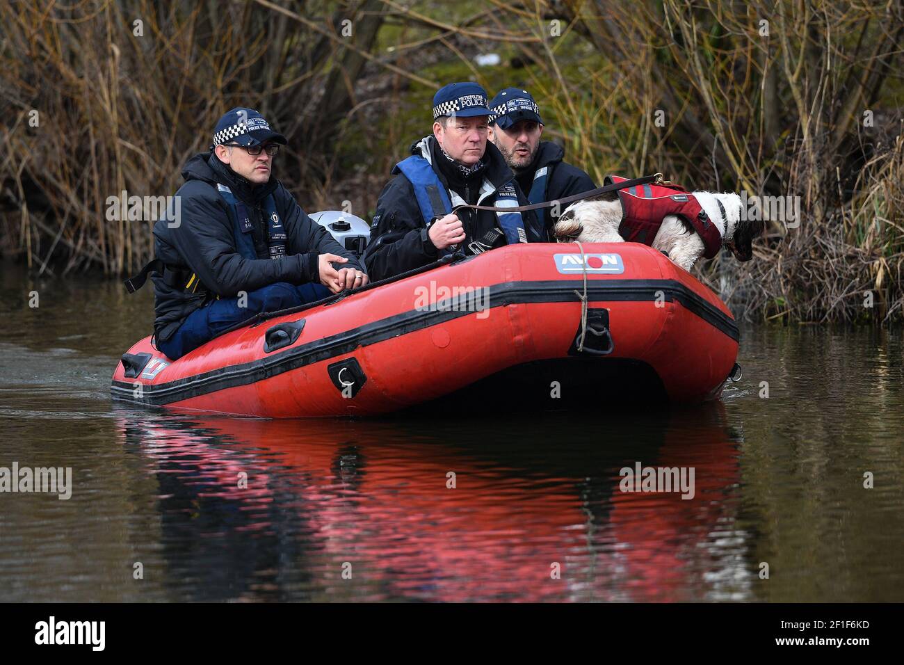 Police in a boat with a sniffer dog search Mount Pond on Clapham Common for missing woman Sarah Everard, 33, who left a friend's house in Clapham, south London, on Wednesday evening at around 9pm and began walking home to Brixton. Picture date: Monday March 8, 2021. Stock Photo