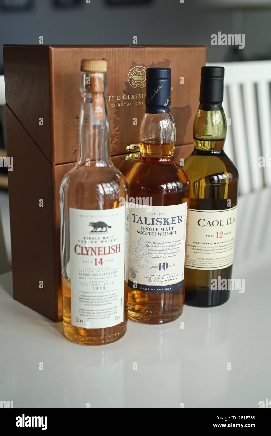 MOTALA, SWEDEN- 2 MARCH 2021: Classic malts selection whisky in a box. Clynelish, Talisker and Caol Ila whisky bottles. Stock Photo