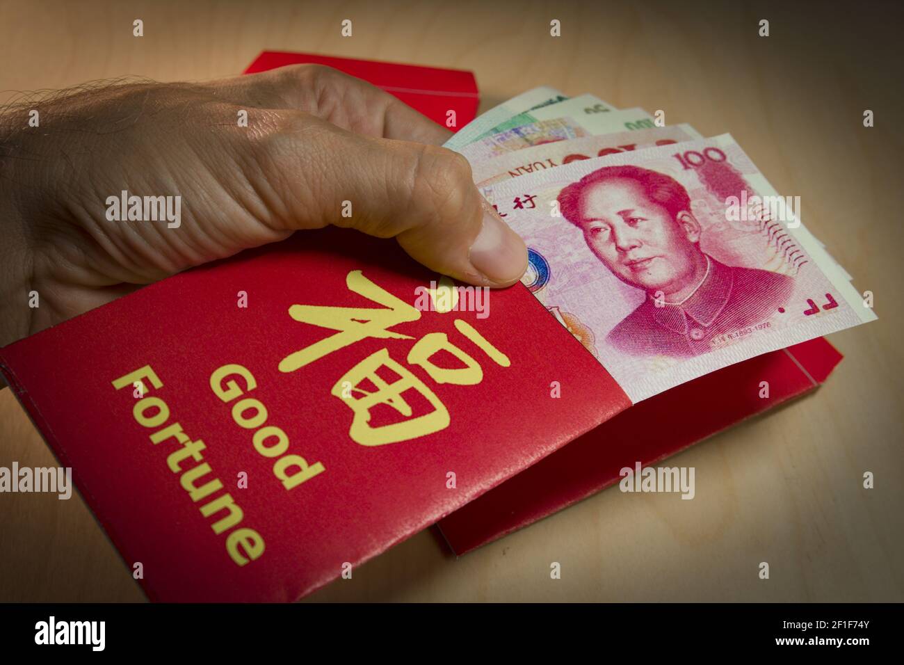Money Cash in Red Envelope isolated on White Background. Chinese