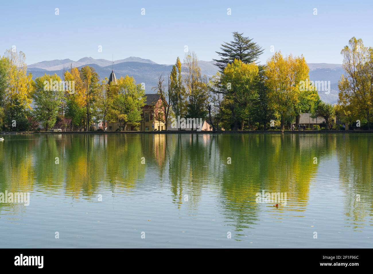 Reflection on the Puigcerda's pond water Stock Photo