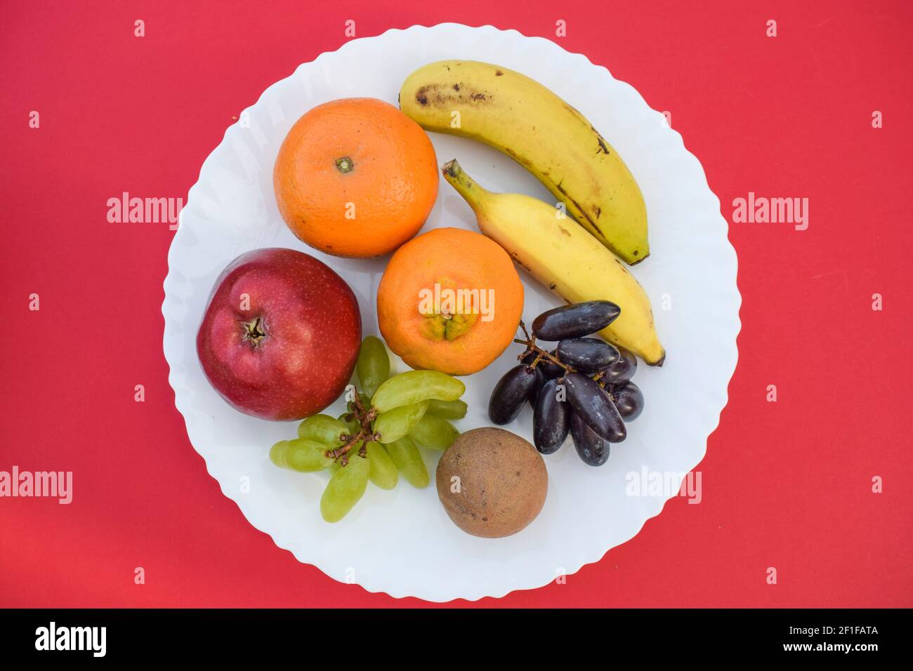 Mix of many fruits like Apple, Oranges, malta, two types of bananas