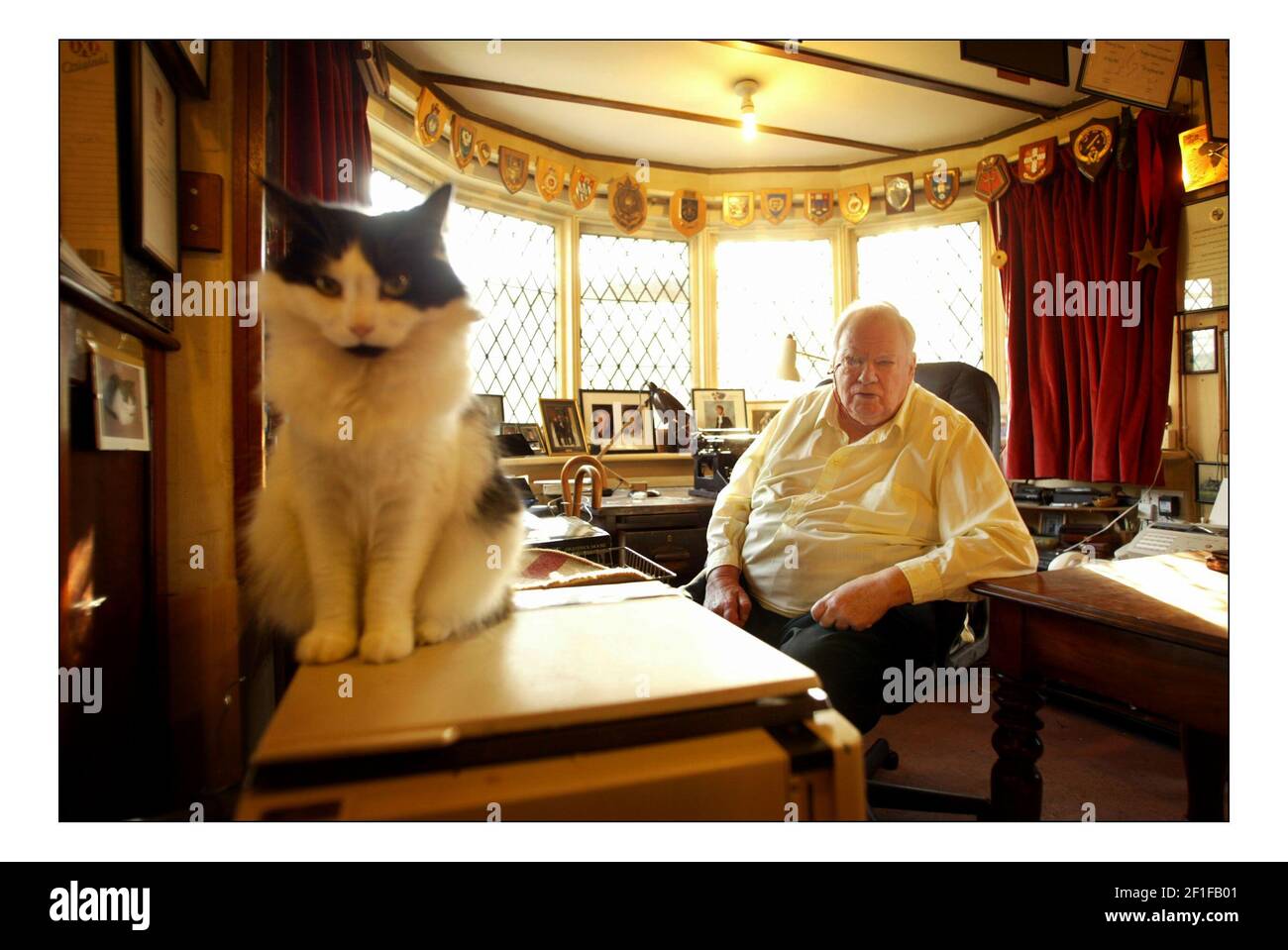 Patrick Moore in his home in Selsey. Pic DAVID SANDISON. 14/2/2005 Stock Photo