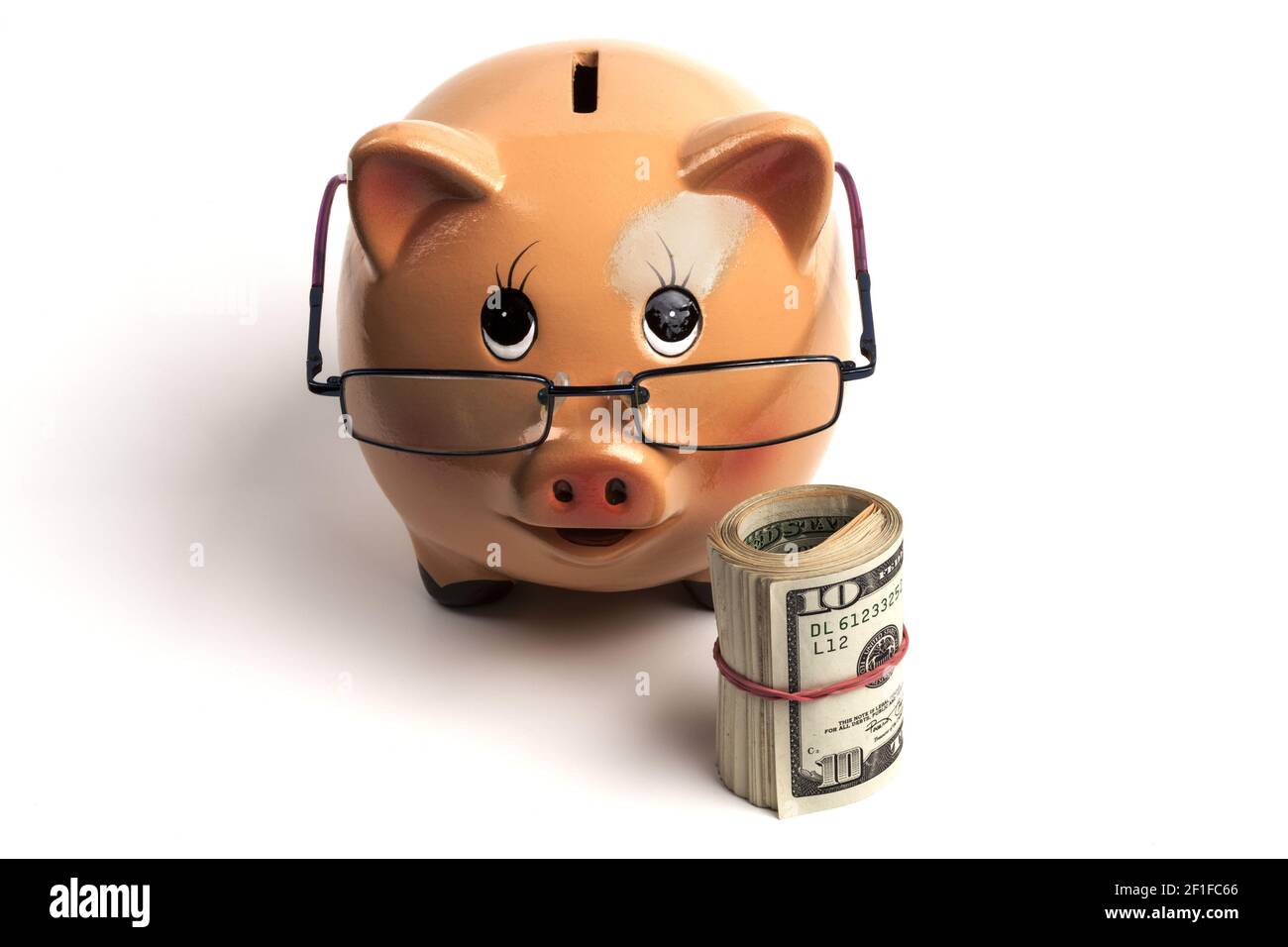 Isolated Piggy Bank With Glasses Stock Photo - Alamy