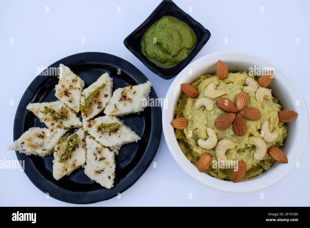 Faradi dhkola, Shakarkandi halwa, green mint coriander chutney eaten during hindi fasting days like ekdasi, mahashivratri, vrat, pooja, religious beli Stock Photo