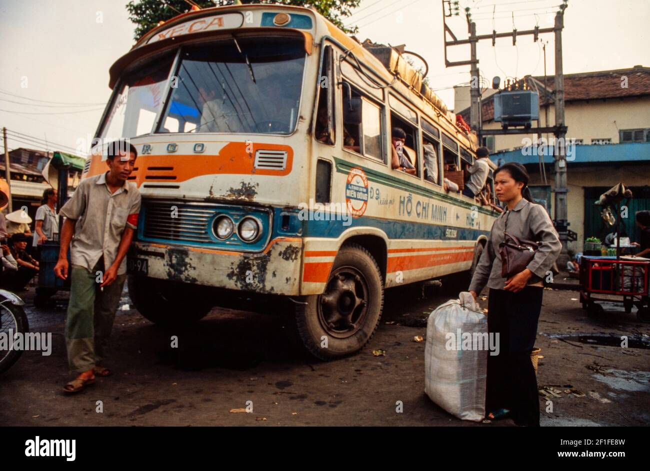 A bus station, Ho Chi Minh City, Vietnam, June 1980 Stock Photo