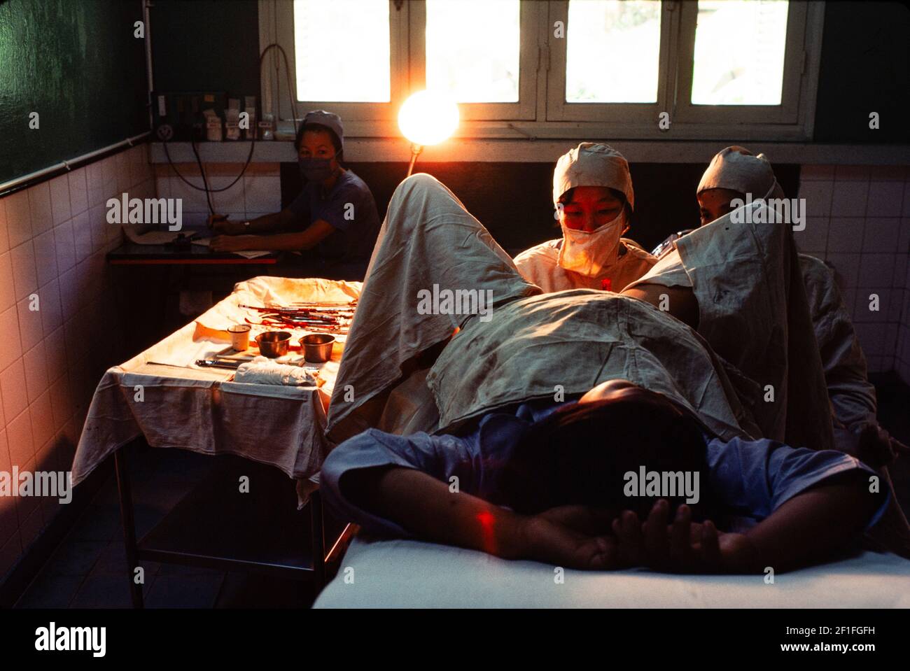 A women having an abortion at the Birth Control Clinic, Ho Chi Minh City, Vietnam, June 1980 Stock Photo