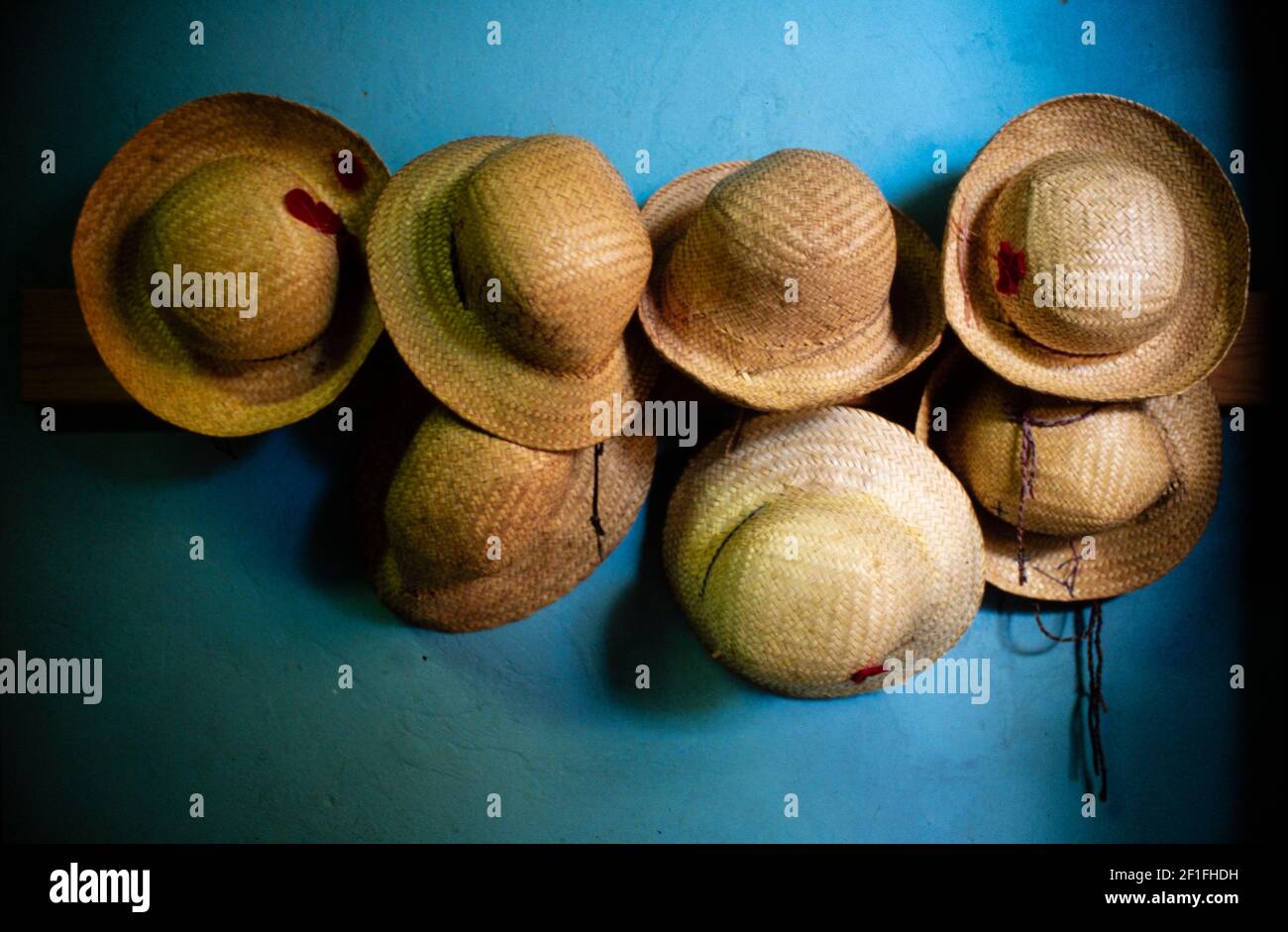Children's hats on their pegs at a school in Ho Chi Minh City, October 1995 Stock Photo