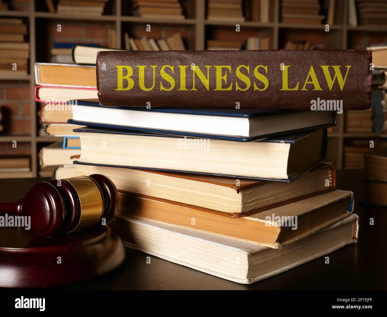 Business law book on the stack of others ones. Stock Photo