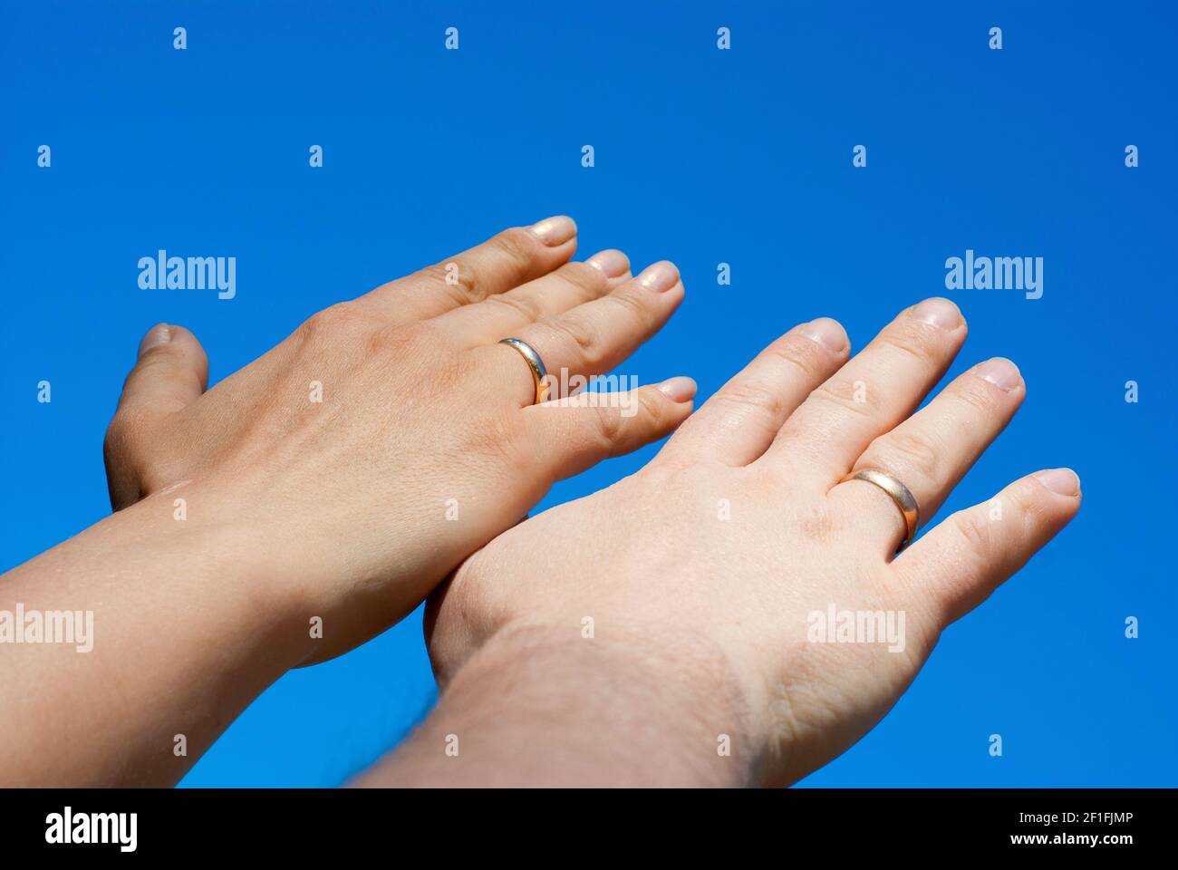 Two hand sky hi-res stock photography and images - Alamy