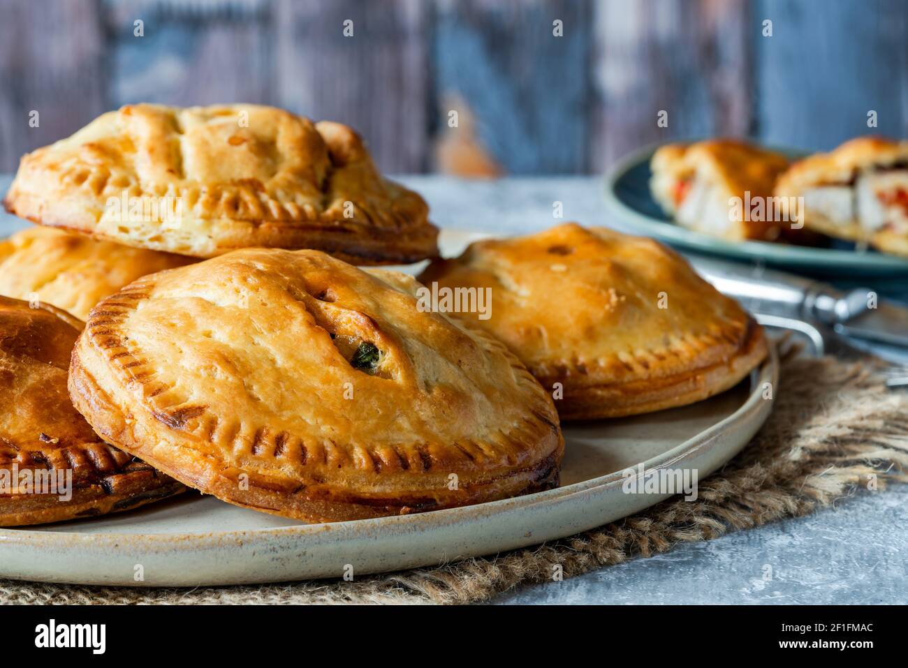 Chicken and chorizo pies in shortcrust pastry Stock Photo - Alamy