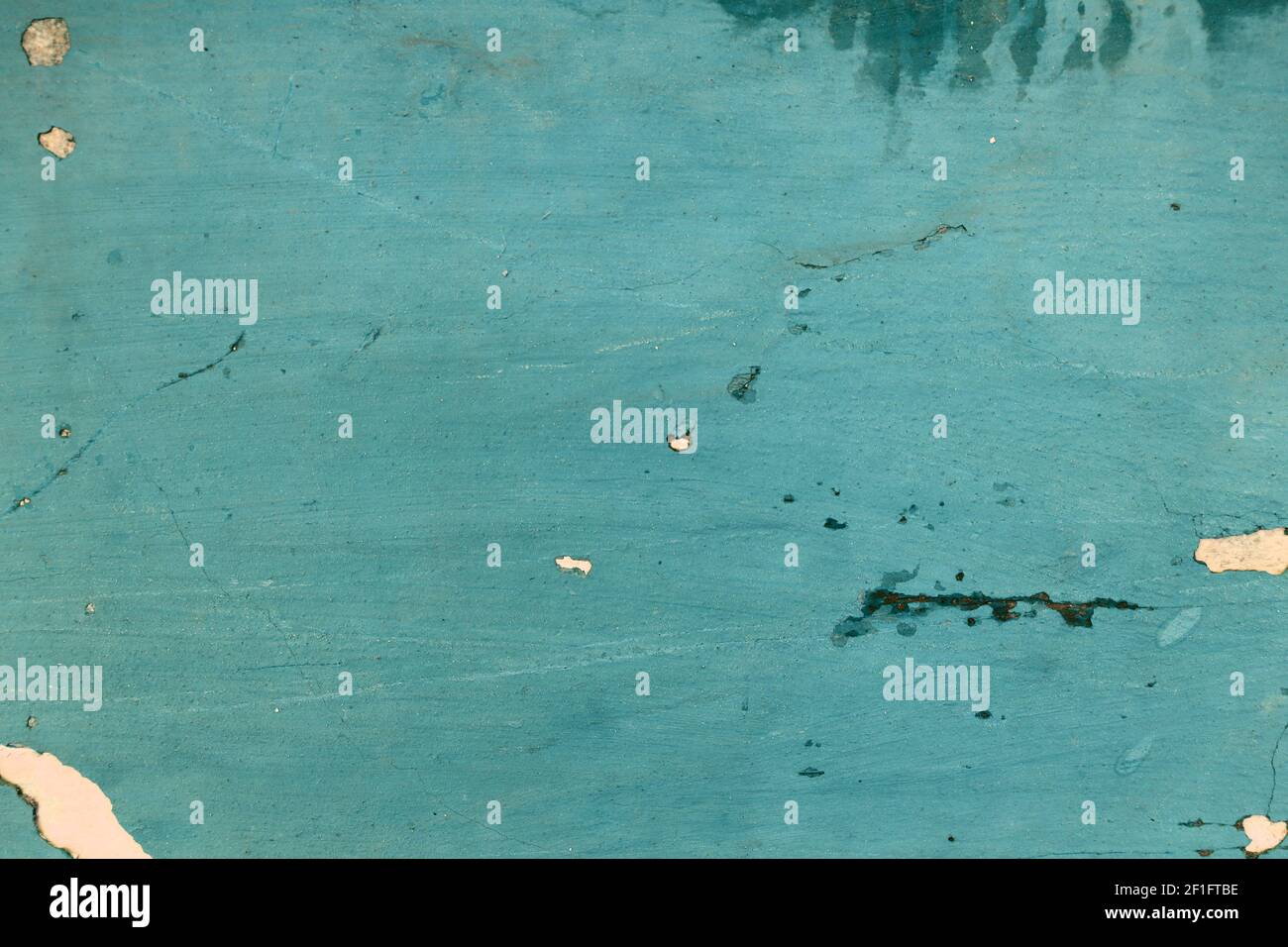 Abstract old cracked wall texture. Vintage scratched wall surface background. Stock Photo