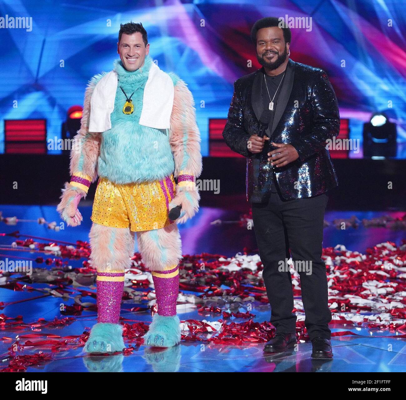 THE MASKED DANCER, from left: Maksim Chmerkovskiy (revealed as Sloth ...
