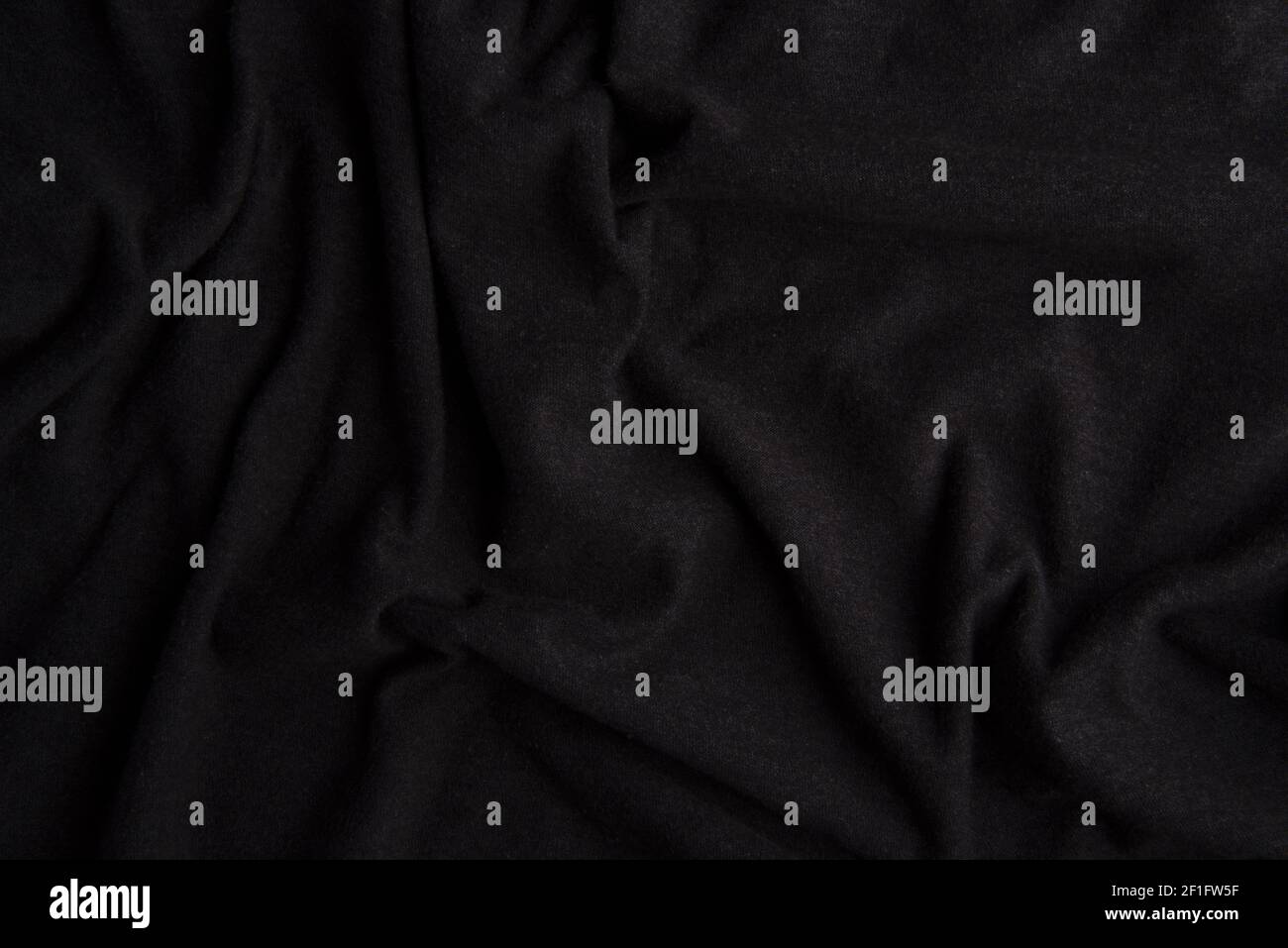A top view of wrinkled and grooved black cloth texture Stock Photo - Alamy