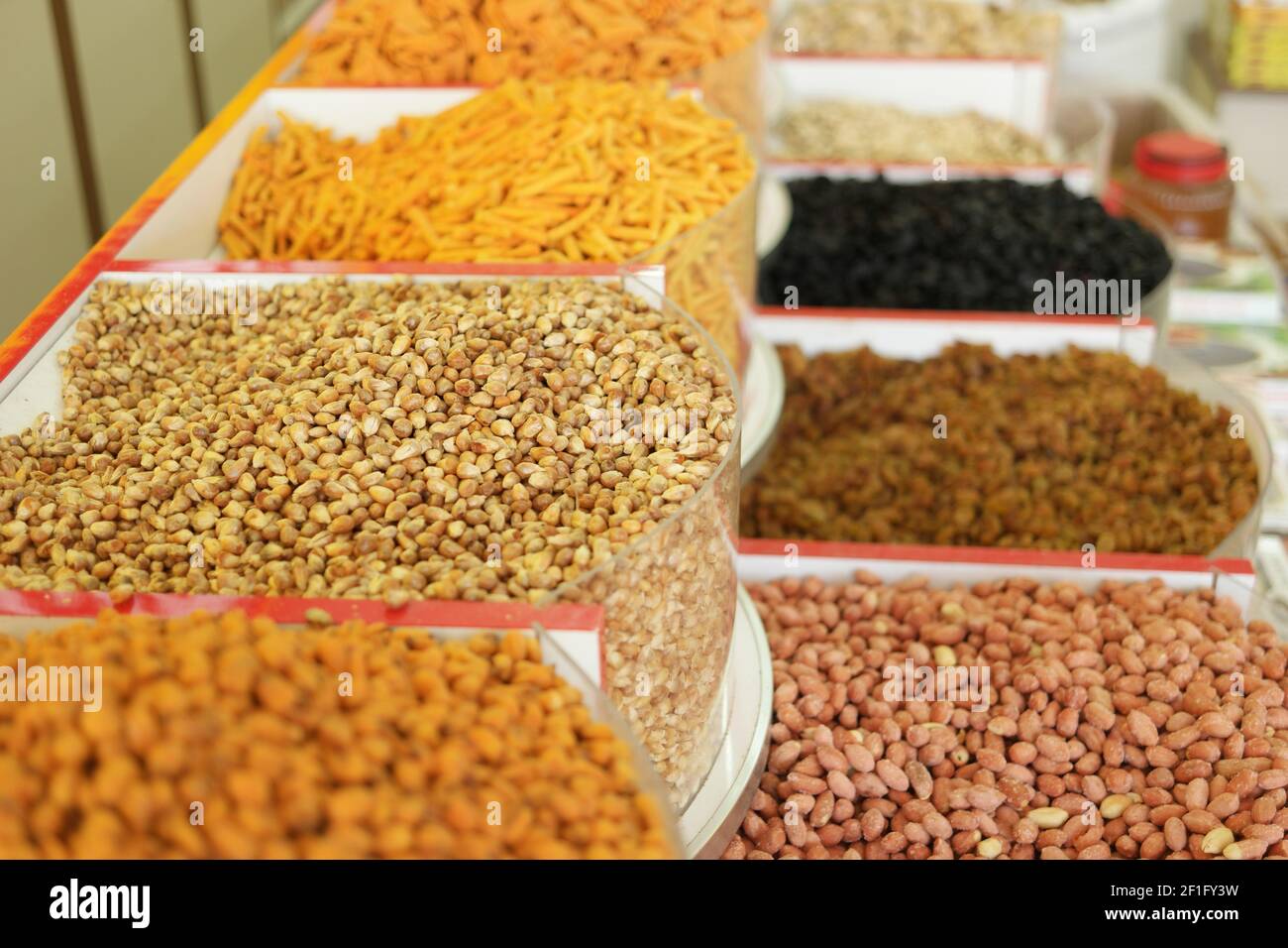 Whole grain beans and nuts in boxes. Stock Photo