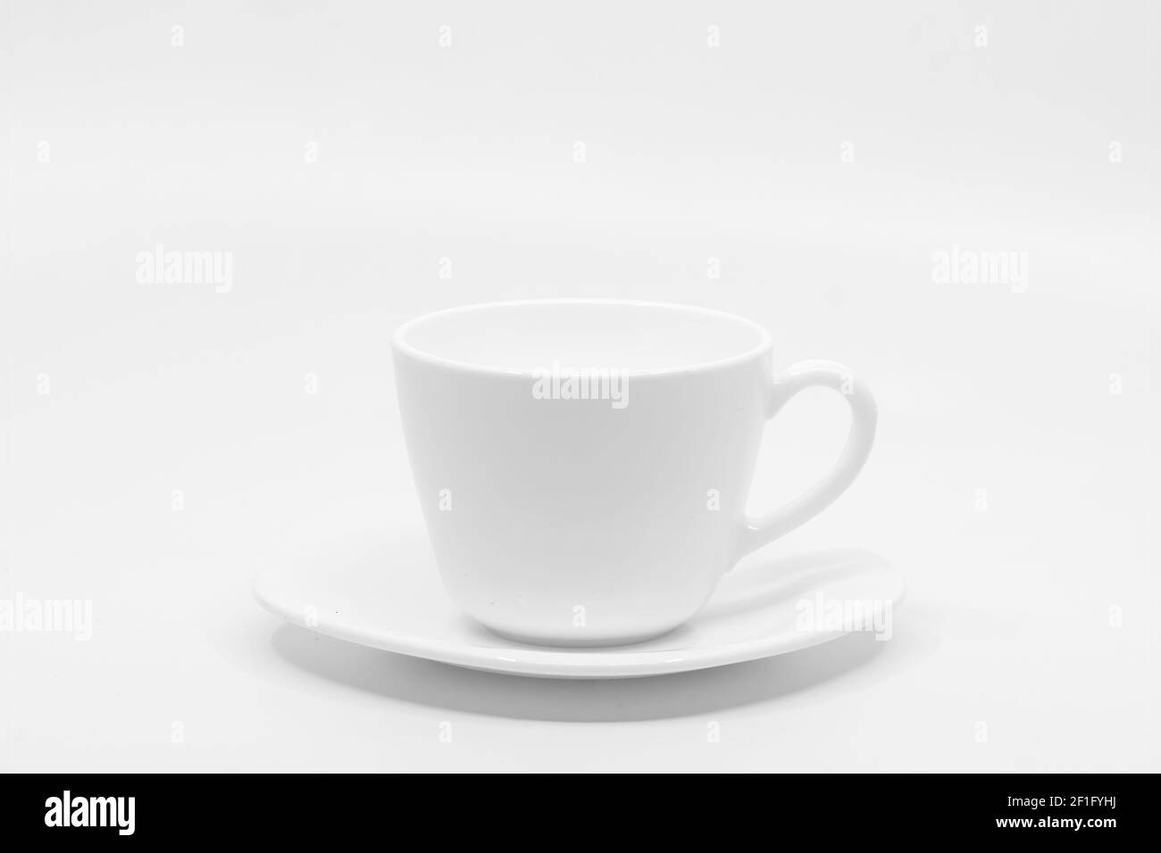 Coffee cup with saucer Isolated on white background Stock Photo - Alamy