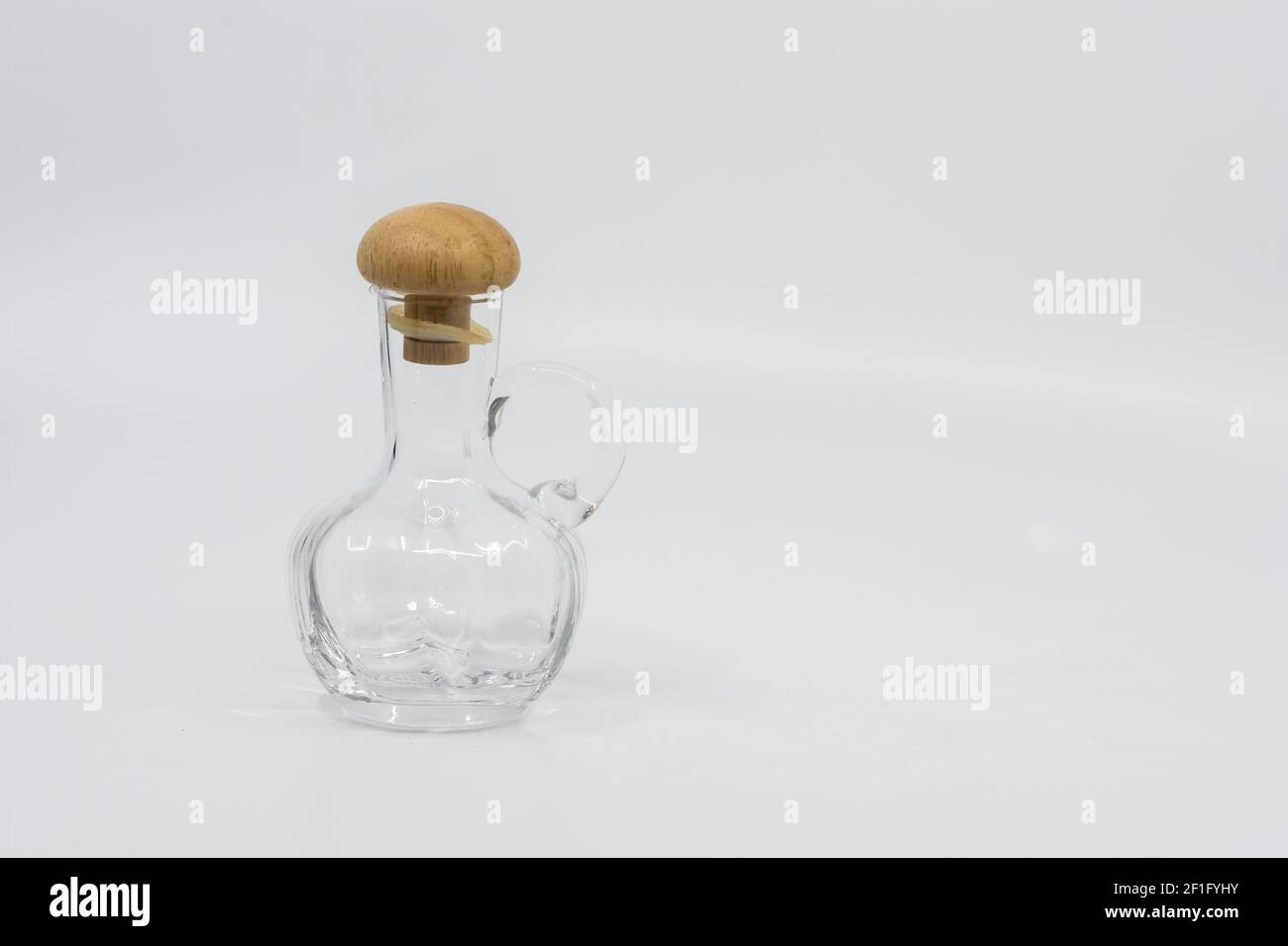 Empty oil bottle isolated on white background Stock Photo - Alamy