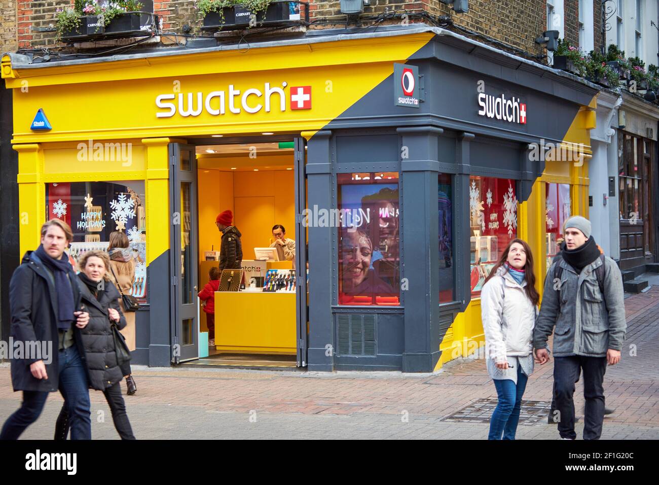General view of the Swatch shop on Carnaby Street in London Stock Photo