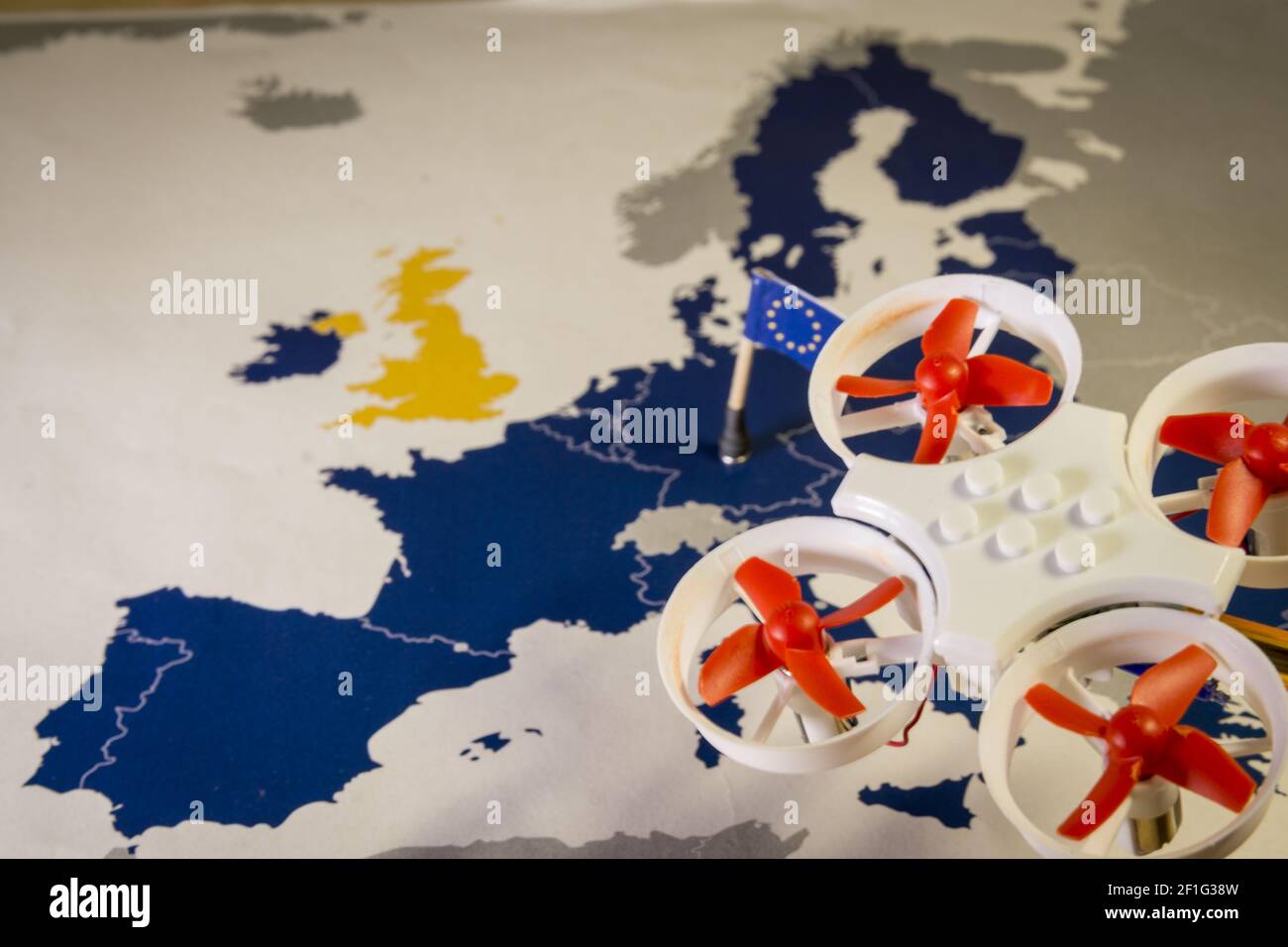 Mini drone flying over a EU map. European rules for drone aerial aircraft law concept Stock Photo