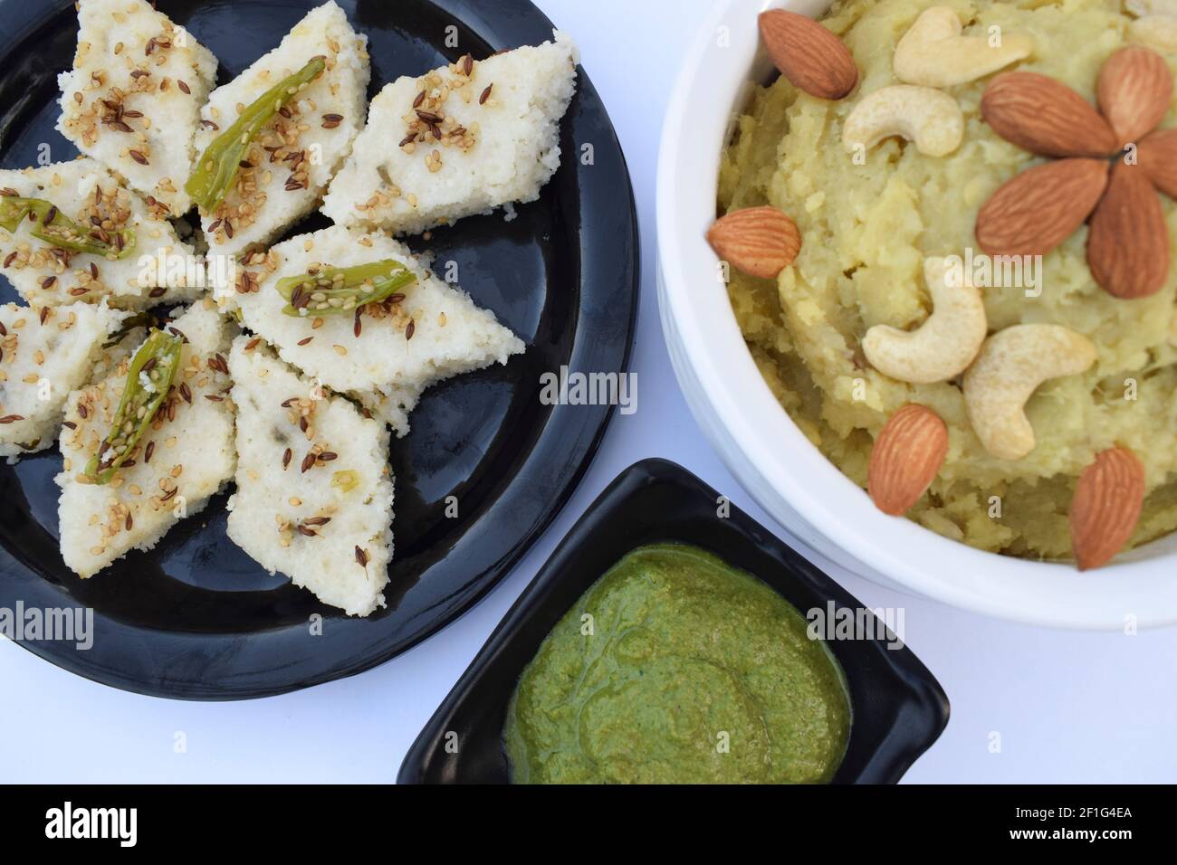 Faradi dhkola, Shakarkandi halwa, green mint coriander chutney eaten during hindi fasting days like ekdasi, mahashivratri, vrat, pooja, religious beli Stock Photo