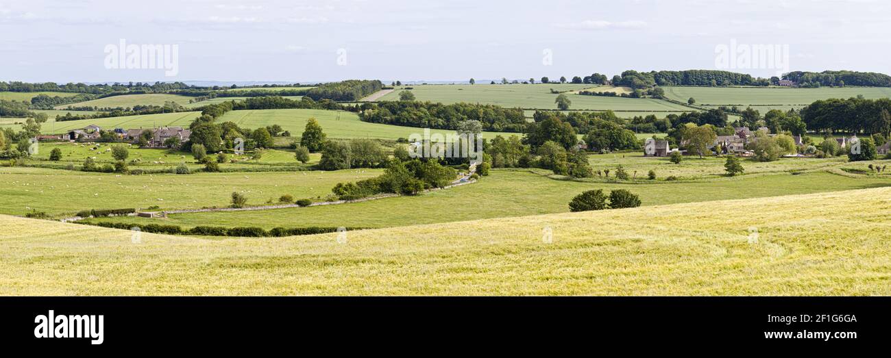 A panoramic view of mxed farming in the valley of the River Windrush at the Cotswold village of Asthall, Oxfordshire UK - Made from 7 high res images. Stock Photo