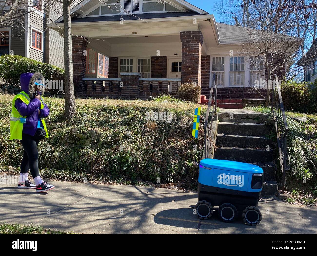 Atlanta Georgia Usa 8th Mar 21 An Amazon Scout Robotic Deliver Vehicle About The Size Of A Large Picnic Cooler Is Tested In A Residential Neighborhood Of The Midtown Section