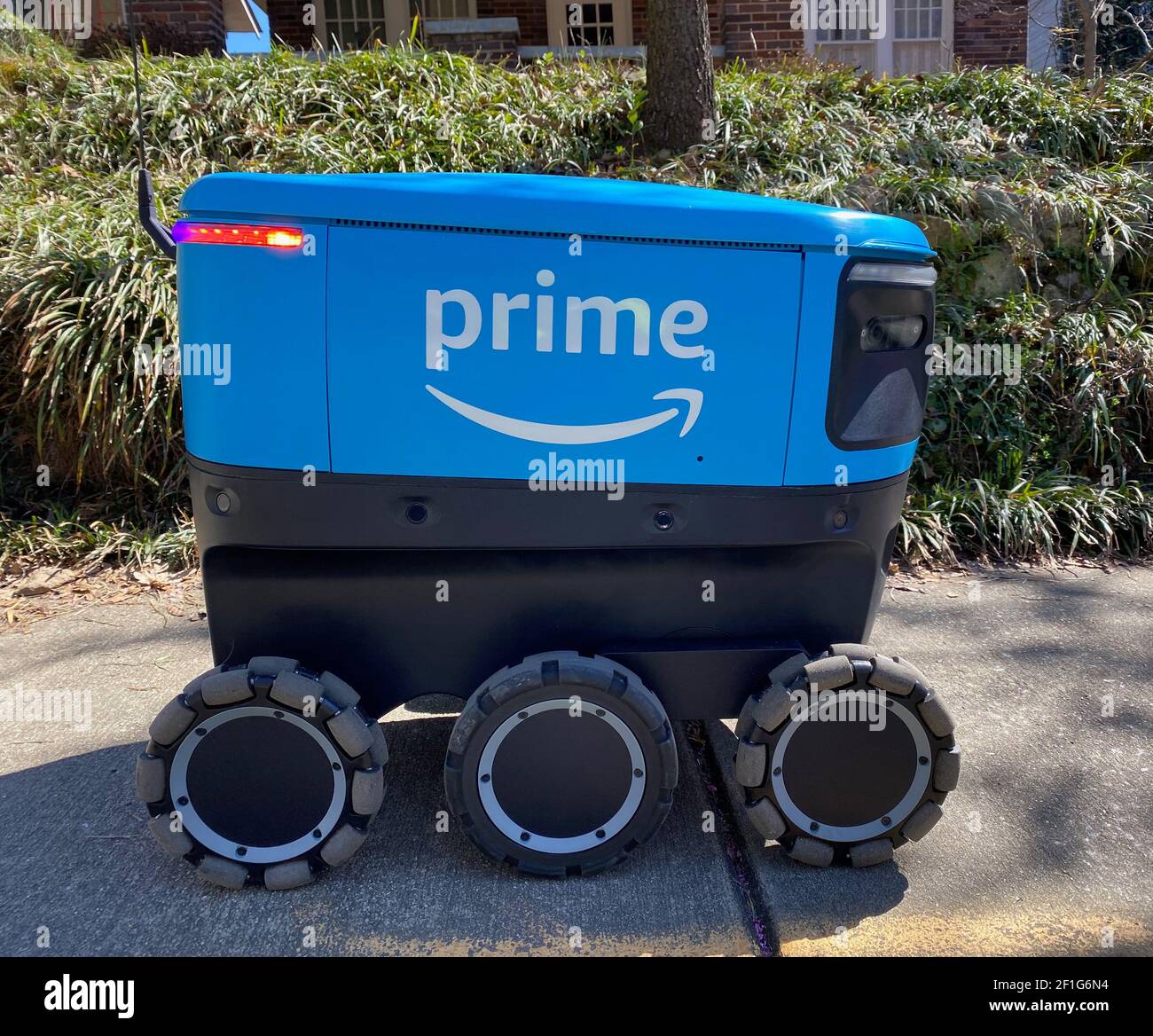 Atlanta Georgia Usa 8th Mar 21 An Amazon Scout Robotic Deliver Vehicle About The Size Of A Large Picnic Cooler Is Tested In A Residential Neighborhood Of The Midtown Section