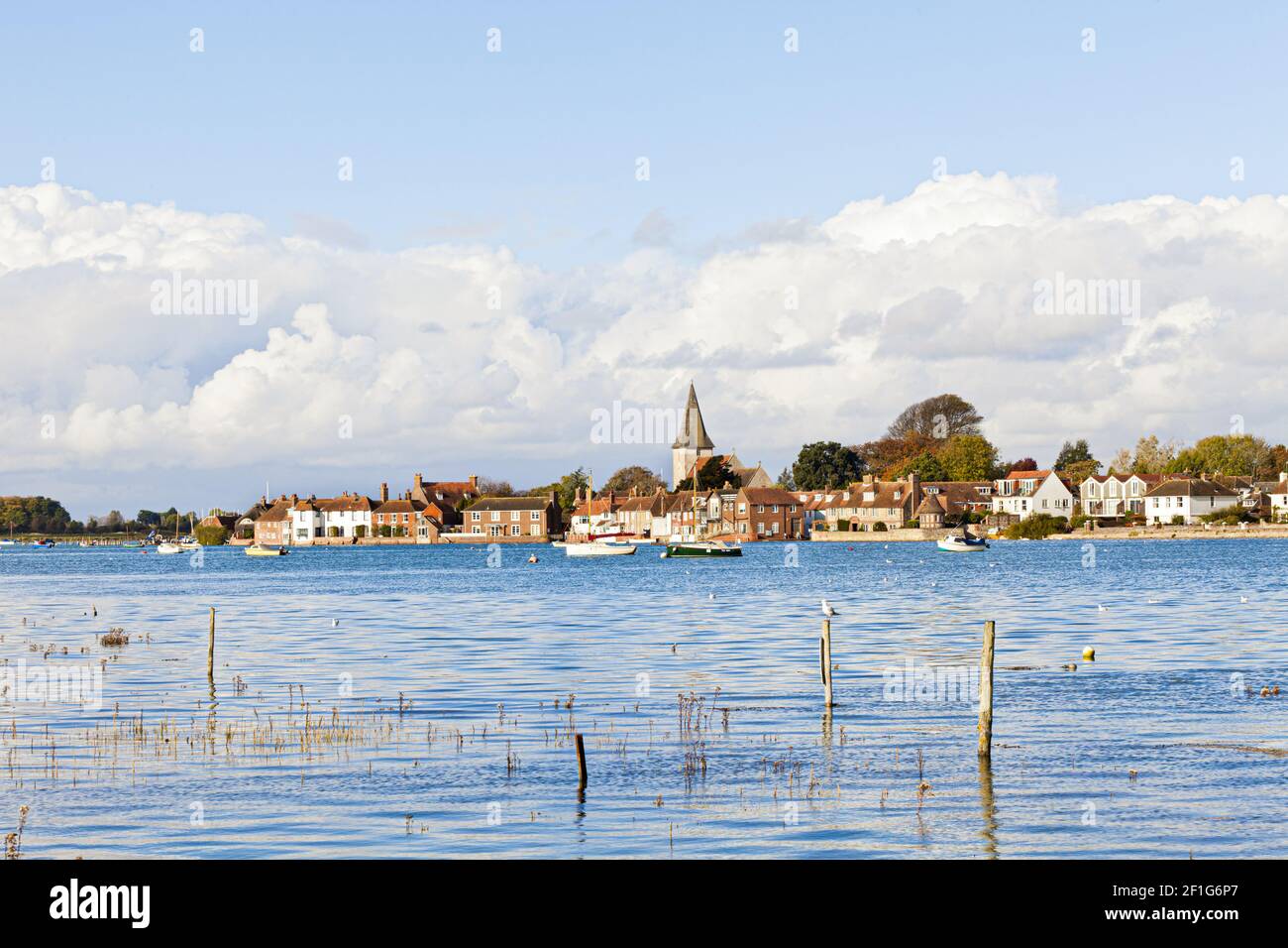 High tide at the village of Bosham, West Sussex UK. It is here that King Canute (Cnut) is reputed to have futilely instructed the tide to go back. Stock Photo