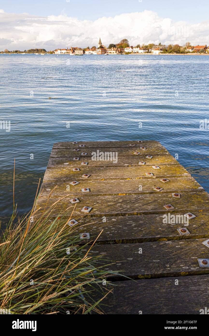 aHigh tide at the village of Bosham, West Sussex UK. It is here that King Canute (Cnut) is reputed to have futilely instructed the tide to go back. Stock Photo