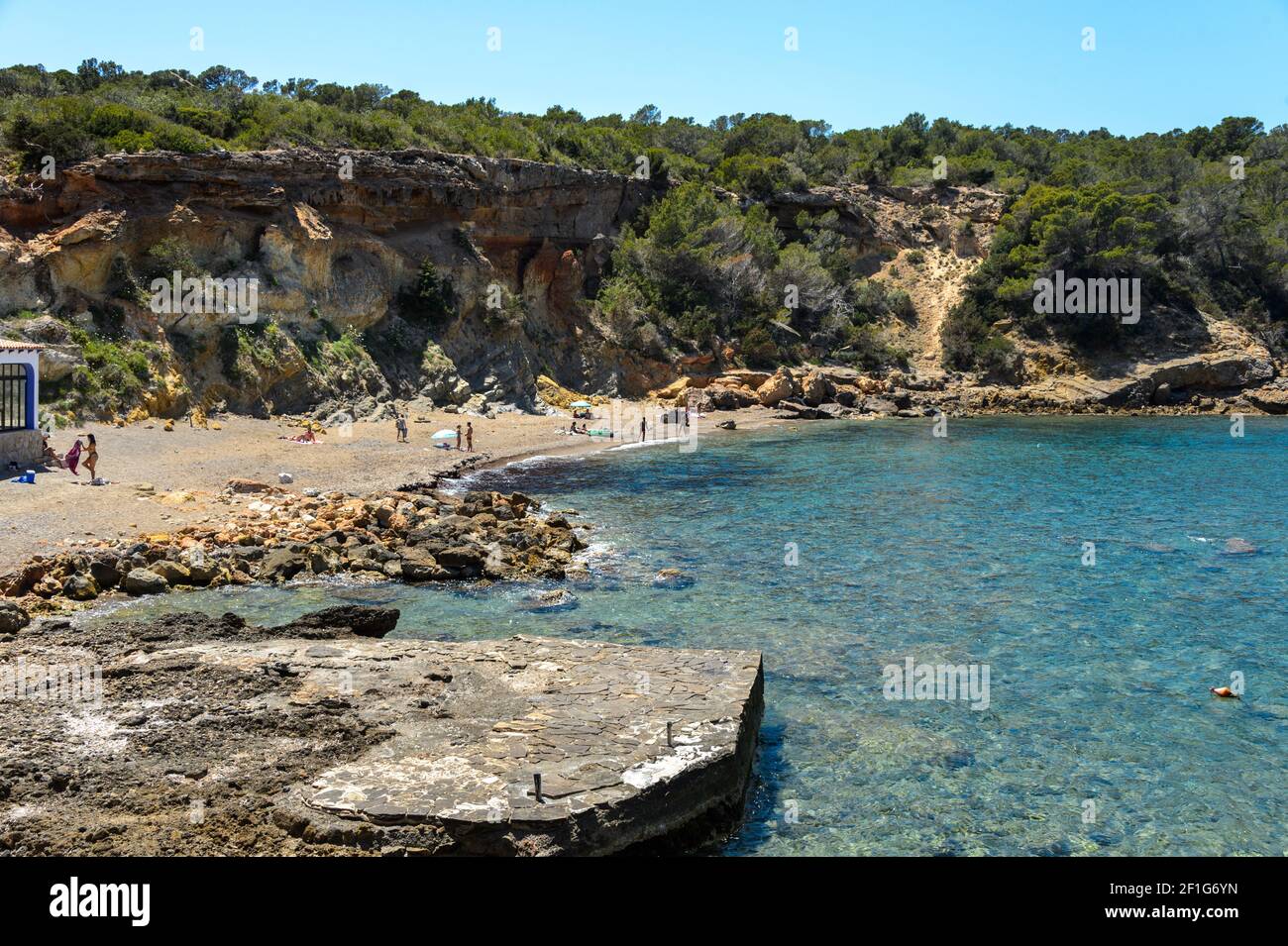 Cala Xarraca, Ibiza, Spain - May 28, 2020: Cala Xarraca one of the best known beaches on the north coast of Ibiza. A steep coast with coarse sand beac Stock Photo