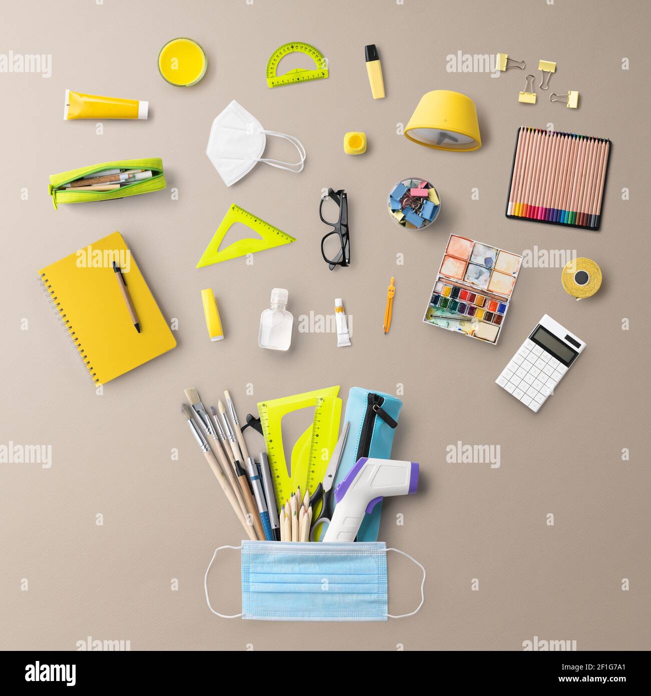 Flat lay top view of face mask and school supplies, back to school and ...