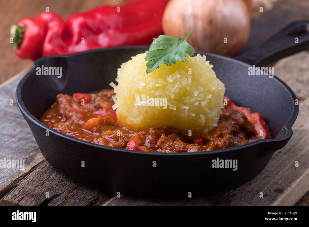 hungarian goulash in an iron pan Stock Photo - Alamy