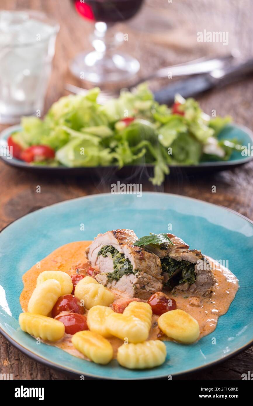 pork fillet with gnocchi and cream sauce Stock Photo Alamy