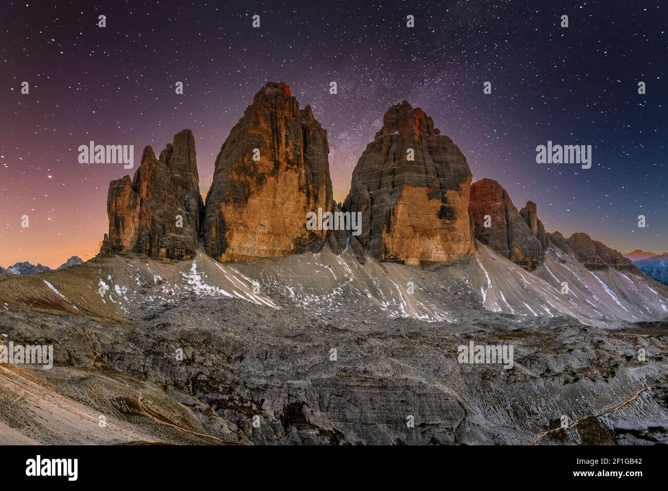Tre Cime di Lavaredo peaks or Drei Zinnen under a starry night, Dobbiaco - Toblach, Trentino - Alto Adige or South Tyrol, Italy Stock Photo