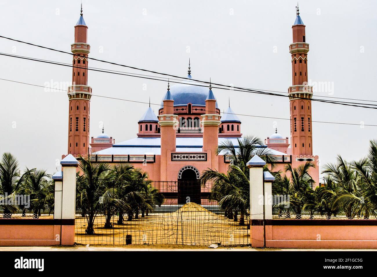 Africa, Senegal, Mbour, Grande Mosquée Gandigal-Est. The great Gandigal-Est mosque of Mbour has a beautiful architecture in pastel tones. Stock Photo