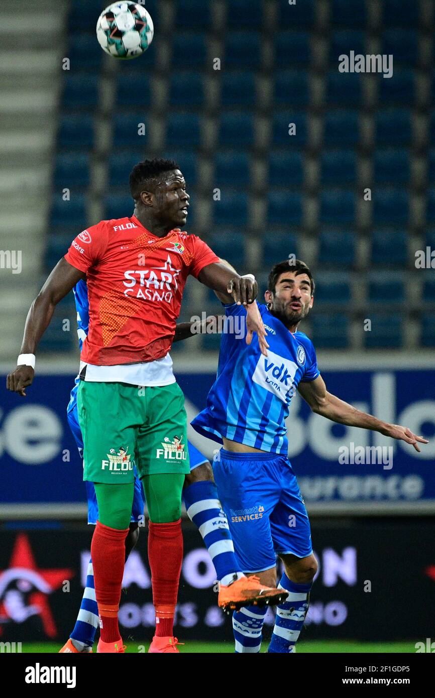 Oostende's Makhtar Gueye and Gent's Milad Mohammadi fight for the ball during a soccer match between KAA Gent and KV Oostende, Monday 08 March 2021 in Stock Photo