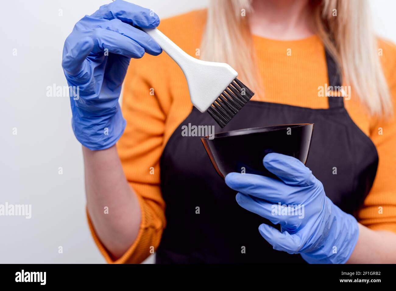 Hairdresser with gloves hires stock photography and images Alamy