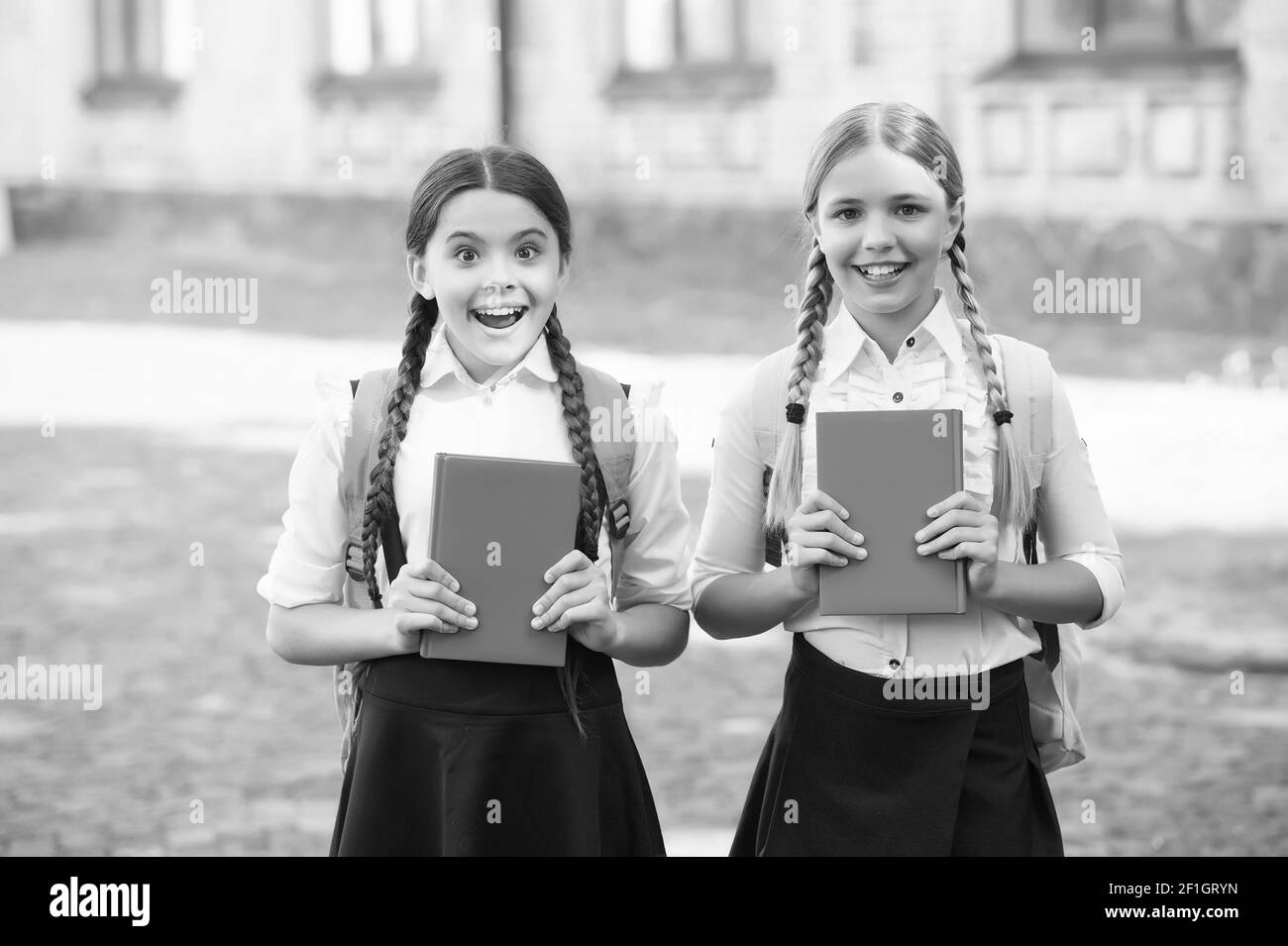 Pupils studying in school uniform Black and White Stock Photos & Images ...