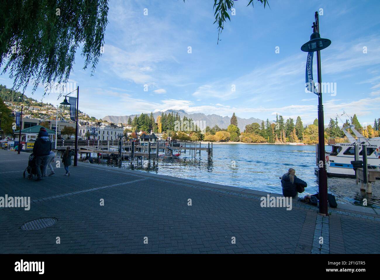 Queenstown Harbour View Walk, South Island New Zealand, Lake Wakatipu and The Remarkables during sunny day Stock Photo
